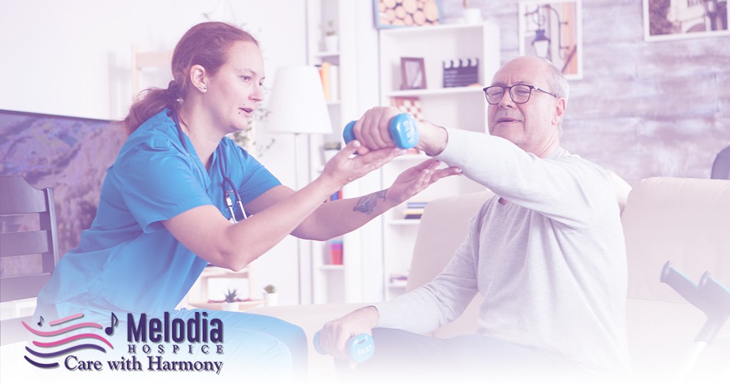 Hospice nurse helping patient with physical therapy