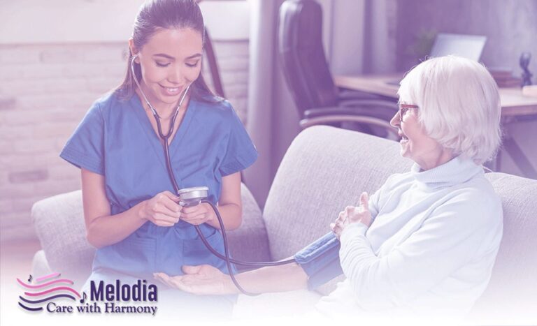 Elder women receiving continuous care, nurse checking blood pressure.