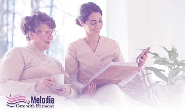 A young nurse is holding a book and helping a hospice patient to read and also explaining what is hospice care.