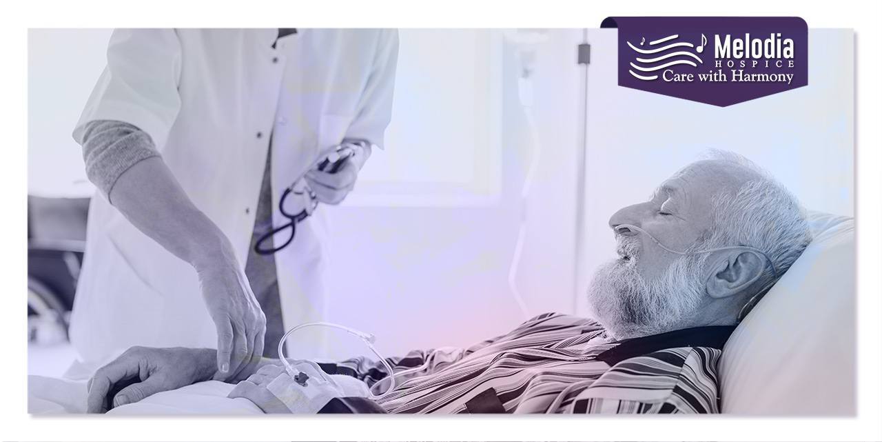 Elder patient with Alzheimer's disease on hospital bed, physician checking vein.