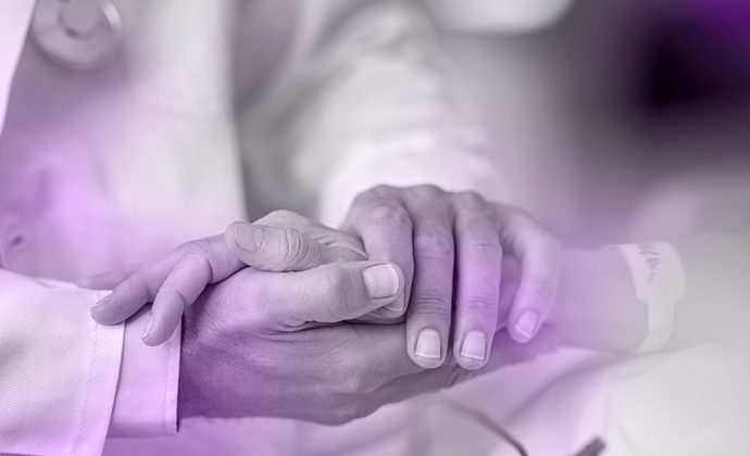 Holding hands representing hospice personalized care